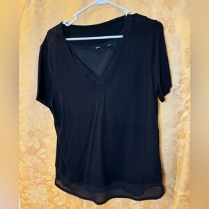 BETABRAND — Double layered, short-sleeved black tee with looped edging.